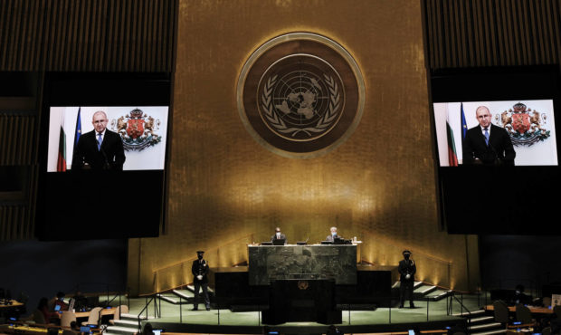 Bulgaria's President Rumen Radev is seen on video screens as he addresses the 76th Session of the U...