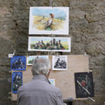 
              A man paints drawings in downtown of San Marino, Sunday, Sept. 26, 2021. Tiny San Marino is one of the last countries in Europe which forbids abortion in any circumstance — a ban that dates from 1865. Its citizens are voting Sunday in a referendum calling for abortion to be made legal in the first 12 weeks of pregnancy. (AP Photo/Antonio Calanni)
            