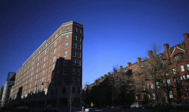 FILE - In this Jan. 17, 2019 file photo, Boston University's Myles Standish Hall dormitory, left, i...