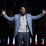 
              FILE - In this Nov. 17, 2015, file photo, R. Kelly performs the national anthem before an NBA basketball game between the Brooklyn Nets and the Atlanta Hawks in New York. A federal jury in New York convicted the R&B superstar Monday, Sept. 27, 2021, in a sex trafficking trial. (AP Photo/Frank Franklin II, File)
            