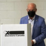 
              Conservative Leader Erin O'Toole casts his ballot for the Canadian general federal election in Bowmanville, Ont. on Monday, Sept. 20, 2021.  (Adrian Wyld/The Canadian Press via AP)
            