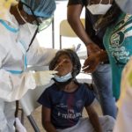 
              A little boy who was deported from the U.S. border with Mexico gets tested for COVID-19 at Toussaint Louverture International Airport in Port-au-Prince, Haiti, Monday, Sept. 20, 2021. The U.S. is flying Haitians camped in a Texas border town back to their homeland. (AP Photo/Joseph Odelyn)
            