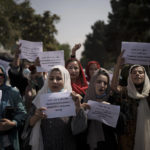 
              Afghan women march to demand their rights under the Taliban rule during a demonstration near the former Women's Affairs Ministry building in Kabul, Afghanistan, Sunday, Sept. 19, 2021. The interim mayor of Afghanistan’s capital said Sunday that many female city employees have been ordered to stay home by the country’s new Taliban rulers. (AP Photo)
            