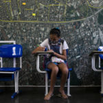 
              A student participates receives instruction at the Redes da Maré NGO, which during the coronavirus pandemic has been giving students access to education, at the Maré Favela, in Rio de Janeiro, Brazil, Wednesday, Sept. 29, 2021. According to the Organisation for Economic Co-operation and Development, Brazil is one of the countries that least invested in education during the pandemic. (AP Photo/Bruna Prado)
            