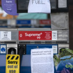 
              Closed pumps are seen on the forecourt of a petrol station in Manchester which has run out of fuel after an outbreak of panic buying in the UK, Monday, Sept. 27, 2021. British Prime Minister Boris Johnson is said to be considering whether to call in the army to deliver fuel to petrol stations as pumps ran dry after days of panic buying. ( AP Photo/Jon Super)
            
