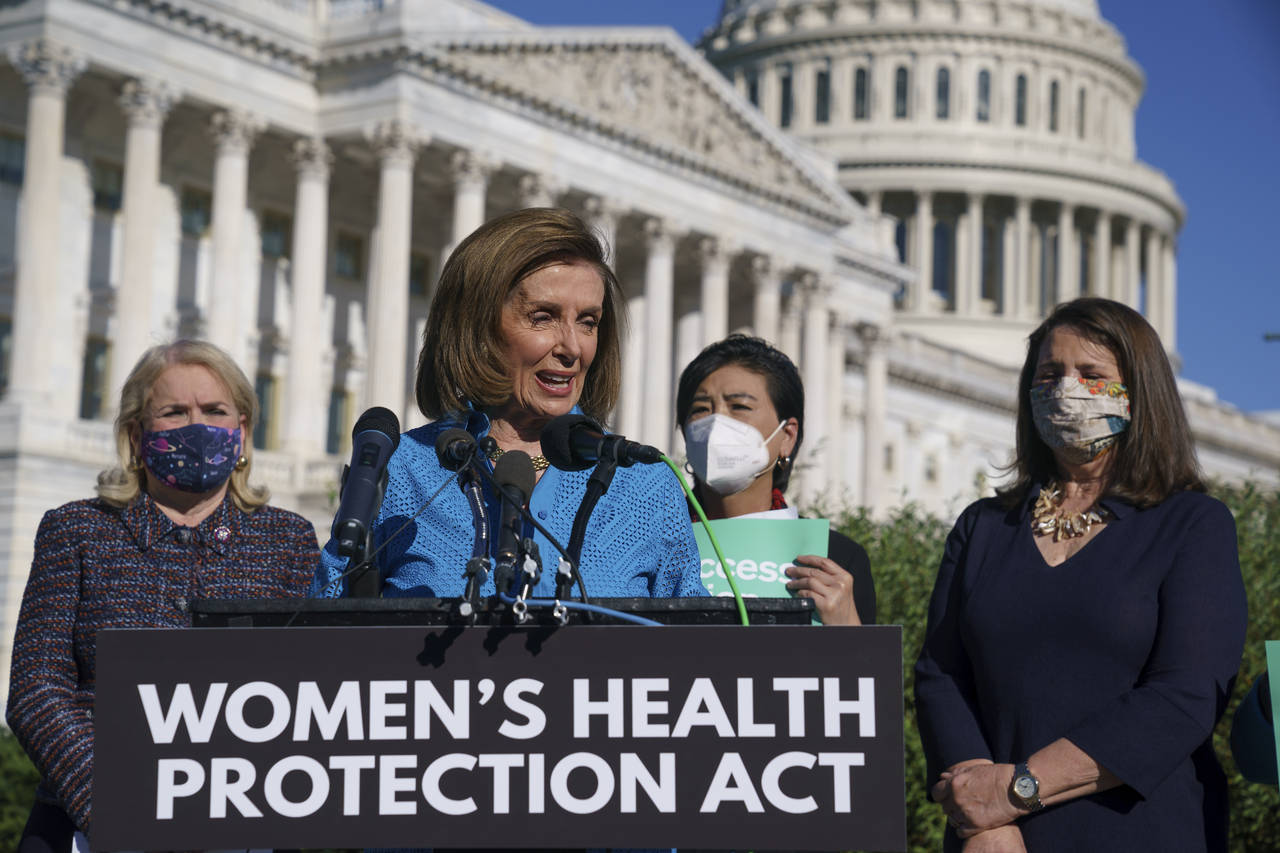 House Speaker Nancy Pelosi, D-Calif., joined from left by Rep. Sylvia Garcia, D-Texas, Rep. Judy Ch...