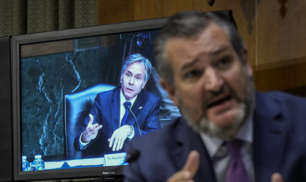 Sen. Ted Cruz, R-Texas, questions Secretary of State Antony Blinken, displayed on a screen, during ...