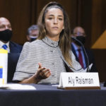 
              United States Olympic gymnast Aly Raisman testifies during a Senate Judiciary hearing about the Inspector General's report on the FBI's handling of the Larry Nassar investigation on Capitol Hill, Wednesday, Sept. 15, 2021, in Washington. Nassar was charged in 2016 with federal child pornography offenses and sexual abuse charges in Michigan. He is now serving decades in prison after hundreds of girls and women said he sexually abused them under the guise of medical treatment when he worked for Michigan State and Indiana-based USA Gymnastics, which trains Olympians. (Graeme Jennings/Pool via AP)
            
