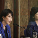 
              Sanae Takaichi, left, and Seiko Noda, right, both former internal affairs ministers and candidates for the presidential election of the ruling Liberal Democratic Party, attend a debate session held by Japan National Press club Saturday, Sept. 18, 2021 in Tokyo. The inclusion of two women among the four candidates vying to become the next prime minister seems like a big step forward for Japan's notoriously sexist politics. (AP Photo/Eugene Hoshiko, Pool)
            