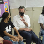 
              Gov. Gavin Newsom meets with students at Melrose Leadership Academy, a TK-8 school in Oakland, Calif., on Wednesday, Sept. 15, 2021, one day after defeating a Republican-led recall effort. (AP Photo/Nick Otto)
            