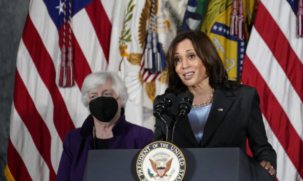 Vice President Kamala Harris, right, speaks as Treasury Secretary Janet Yellen, left, listens durin...