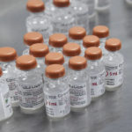 
              Bottles of the CoronaVac COVID-19 vaccine are pictured at the Saidal factory in Constantine, Wednesday, Sept.29, 2021. Algeria's first home-produced coronavirus vaccines came off the assembly line Wednesday, as part of a cooperation deal with the makers of China's Sinovac vaccine. The "CoronaVac" vaccines were made at the Saidal factory in the Algerian city of Constantine, which authorities say is aiming to produce up to 5 million doses per month. (AP Photo)
            