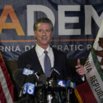 
              California Gov. Gavin Newsom addresses reporters, after beating back the recall attempt that aimed to remove him from office, at the John L. Burton California Democratic Party headquarters in Sacramento, Calif., Tuesday, Sept. 14, 2021. (AP Photo/Rich Pedroncelli)
            