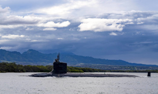 In this photo provided by U.S. Navy, the Virginia-class fast-attack submarine USS Missouri (SSN 780...