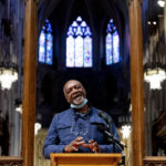 
              Artist Kerry James Marshall speaks at a news conference after being selected to design a replacement of former Confederate-themed stained glass windows that were taken down in 2017 at the National Cathedral in Washington, Thursday, Sept. 23, 2021. The Cathedral has also commissioned Pulitzer-nominated poet Dr. Elizabeth Alexander to pen a poem that will be inscribed in the stone beneath the new windows. (AP Photo/Andrew Harnik)
            