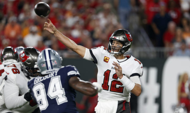 Tampa Bay Buccaneers quarterback Tom Brady (12) fires a pass against the Dallas Cowboys during the ...