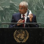 
              Maldives President Ibrahim Mohamed Solih takes off his mask to address the 76th Session of the United Nations General Assembly at U.N. headquarters in New York on Tuesday, Sept. 21, 2021.   (Eduardo Munoz/Pool Photo via AP)
            