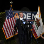 
              California Gov. Gavin Newsom addresses reporters after beating back the recall attempt that aimed to remove him from office, at the John L. Burton California Democratic Party headquarters in Sacramento, Calif., Tuesday, Sept. 14, 2021. (AP Photo/Rich Pedroncelli)
            