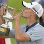 
              Nicolai Hojgaard of Denmark kisses the trophy of the Italian Open golf tournament he just won, in Guidonia, in the outskirts of Rome, Sunday, Sept. 5, 2021. The Italian Open took place on the redesigned Marco Simone course just outside Rome that will host the 2023 Ryder Cup.(AP Photo/Andrew Medichini)
            