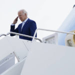 
              FILE - In this Monday, Sept. 13, 2021, file photo, President Joe Biden salutes before boarding Air Force One for a trip to visit the National Interagency Fire Center in Boise, Idaho, in Andrews Air Force Base, Md. On Friday, Sept. 17, 2021, The Associated Press reported on stories circulating online incorrectly asserting Biden had ordered the Department of Veterans Affairs to withhold health care benefits from unvaccinated veterans. “The President has not and will not withhold benefits to Veterans who choose not to be vaccinated,” Veterans Affairs Press Secretary Terrence L. Hayes said.  (AP Photo/Evan Vucci, File)
            