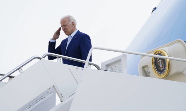 FILE - In this Monday, Sept. 13, 2021, file photo, President Joe Biden salutes before boarding Air ...