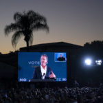 
              A large screen shows California Gov. Gavin Newsom as he speaks at a rally ahead of the California gubernatorial recall election Monday, Sept. 13, 2021, in Long Beach, Calif. (AP Photo/Jae C. Hong)
            
