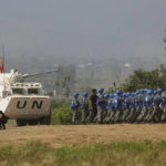 
              United Nations troops break up fighting in a scenario where participants playing the role of civilians fighting over water resource during the Shared Destiny 2021 drill at the Queshan Peacekeeping Operation training base in Queshan County in central China's Henan province  Wednesday, Sept. 15, 2021. Peacekeeping troops from China, Thailand, Mongolia and Pakistan took part in the 10 days long exercise that field reconnaissance, armed escort, response to terrorist attacks, medical evacuation and epidemic control. (AP Photo/Ng Han Guan)
            