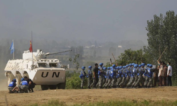 United Nations troops break up fighting in a scenario where participants playing the role of civili...