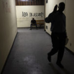 
              A wall inside the Palace of Justice is spray-painted with a message that reads in Creole; "Down with insecurity", in Port-au-Prince, Haiti, Thursday, Sept. 16, 2021. Even before the assassination of President Jovenel Moise in July, the government was weak -- the Palace of Justice inactive, congress disbanded by Moise and the legislative building pocked by bullets. (AP Photo/Rodrigo Abd)
            
