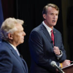 
              FILE - In this Sept. 16, 2021, file photo Republican gubernatorial candidate Glenn Youngkin, right, gestures as Democratic gubernatorial candidate and former governor Terry McAuliffe, left, looks on during a debate at the Appalachian School of Law in Grundy, Va.McAuliffe has generally led in public polling, but recent surveys have suggested his lead is tightening. His race against Glenn Youngkin is one of the country’s most competitive and closely watched political matchups of the year. (AP Photo/Steve Helber, File)
            