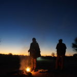 
              Migrants trying to reach the U.S., many from Haiti, camp out in Ciudad Acuna, Mexico, at dawn Thursday, Sept. 23, 2021, across the Rio Grande river, the natural border with Del Rio, Texas. (AP Photo/Fernando Llano)
            