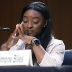 
              United States Olympic gymnast Simone Biles testifies during a Senate Judiciary hearing about the Inspector General's report on the FBI's handling of the Larry Nassar investigation on Capitol Hill, Wednesday, Sept. 15, 2021, in Washington. Nassar was charged in 2016 with federal child pornography offenses and sexual abuse charges in Michigan. He is now serving decades in prison after hundreds of girls and women said he sexually abused them under the guise of medical treatment when he worked for Michigan State and Indiana-based USA Gymnastics, which trains Olympians. (Saul Loeb/Pool via AP)
            