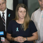 
              Nichole Schmidt, mother of Gabby Petito, whose death on a cross-country trip has sparked a manhunt for her boyfriend Brian Laundrie, pauses as she answer reporter's questions during a news conference, Tuesday, Sept. 28, 2021, in Bohemia, N.Y. (AP Photo/John Minchillo)
            