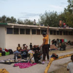 
              Haitian migrants begin to stir at an encampment at a sports park in Ciudad Acuna, Mexico, Tuesday, Sept. 21, 2021. U.S. authorities have moved to expel many of the migrants who were camped around a bridge in Del Rio, Texas, after crossing from Ciudad Acuna, Mexico. Officials are also trying to to block others from crossing the border from Mexico. (AP Photo/Felix Marquez)
            