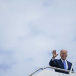 
              President Joe Biden waves as he boards Air Force One for a trip to Connecticut to promote his "Build Back Better" agenda, Friday, Oct. 15, 2021, in Andrews Air Force Base, Md. (AP Photo/Evan Vucci)
            