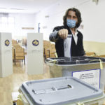 
              Kosovo Democratic League (LDK), candidate for mayor, Perparim Rama, casts his ballot at a polling station in Pristina Kosovo, Sunday, Oct. 17, 2021. Kosovo is holding municipal elections Sunday in which the eight-month-old leftwing governing party aims at capturing the capital Pristina's city hall. (AP Photo/Visar Kryeziu)
            