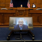 
              Darren Woods, CEO of ExxonMobil testifies via video conference during a House Committee on Oversight and Reform hearing on the role of fossil fuel companies in climate change, Thursday, Oct. 28, 2021, on Capitol Hill in Washington. (AP Photo/Jacquelyn Martin)
            