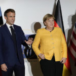 
              British Prime Minister Boris Johnson, French President Emmanuel Macron, German Chancellor Angela Merkel, and U.S. President Joe Biden, from left, pose for the media prior to a meeting at the La Nuvola conference center for the G20 summit in Rome, Saturday, Oct. 30, 2021. The two-day Group of 20 summit is the first in-person gathering of leaders of the world's biggest economies since the COVID-19 pandemic started. (AP Photo/Kirsty Wigglesworth, Pool)
            