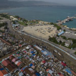 
              The Croix des Bossales market, translated from Creole to the Slaves Market, a gang-controlled area, is located in the port district of La Saline in Port-au-Prince, Haiti, Monday, Oct. 4, 2021. Gangs control up to 40% of Port-au-Prince, a city of more than 2.8 million people where gangs fight over territory daily. (AP Photo/Rodrigo Abd)
            