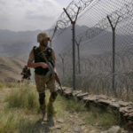 
              FILE - In this Aug. 3, 2021 file photo, Pakistan Army troops patrol along the fence on the Pakistan Afghanistan border at Big Ben hilltop post in Khyber district, Pakistan. The Taliban win in Afghanistan is giving a boost to militants in neighboring Pakistan. The Pakistani Taliban, known as the TTP, have become emboldened in tribal areas along the border with Afghanistan. (AP Photo/Anjum Naveed, File)
            
