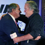 
              Political strategist Steve Bannon, right, greets talks how host John Frederick, during an election rally in Richmond, Va., Wednesday, Oct. 13, 2021. Conservative radio host John Fredericks, a former Trump campaign chairman in Virginia, organized the "Take Back Virginia Rally" in which former President Donald Trump called in. (AP Photo/Steve Helber)
            