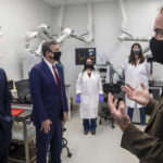 
              Professor Detlef Knappe, right, leads Michael Regan, left, the head of the Environmental Protection Agency, and Gov. Roy Cooper on a tour of a laboratory that tests water samples for "forever chemicals," or PFAS, following an announcement of a Biden administration EPA plan to address PFAS pollution Monday, Oct. 18, 2021, at N.C. State University in Raleigh, N.C. (Travis Long/The News & Observer via AP)
            