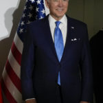 
              U.S. President Joe Biden smiles when posing for a picture at the La Nuvola conference center for the G20 summit in Rome, Saturday, Oct. 30, 2021. The two-day Group of 20 summit is the first in-person gathering of leaders of the world's biggest economies since the COVID-19 pandemic started. (AP Photo/Kirsty Wigglesworth, Pool)
            