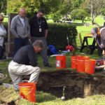 
              CORRECTS VICTIM'S NAME TO ROBIN PELKEY, INSTEAD OF HARRIET ROBIN PELKEY - FILE - In this Sept. 3, 2014, file photo, workers and medical examiner crew members exhume the body of Jane Doe #3 from a cemetery in Anchorage, Alaska. The remains of a woman known for 37 years only as Horseshoe Harriet, one of 17 victims of a notorious Alaska serial killer, have been identified through DNA profiling as Robin Pelkey, authorities said Friday, Oct. 22, 2021. (AP Photo/Rachel D'Oro, File)
            