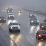 
              Fog and rain make driving the Interstate 5 freeway in the San Fernando Valley treacherous, Monday, Oct. 25, 2021. Heavy rain moving down from Northern California is expected to hit the Los Angeles area today. (David Crane/The Orange County Register via AP)
            