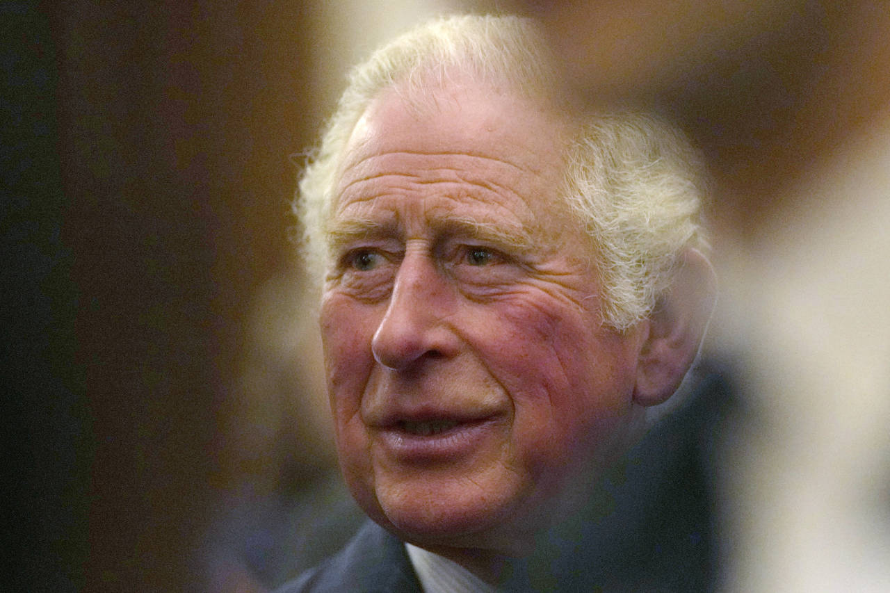 FILE - In this Oct. 19, 2021 file photo, Britain's Prince Charles greets guests at a reception for ...