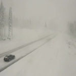 
              In this image taken from video from a Caltrans remote video traffic camera, very light traffic is seen in the snow along Interstate 80 at Donner Summit, Calif., Monday, Oct. 25, 2021. Rainfall records were shattered and heavy snow pounded high elevations of the Sierra Nevada. Officials said mountain areas above 9,000 feet (2,745 meters) in the Sierra Nevada could get 18 inches (46 centimeters) of snow or more from Sunday until Monday morning. (Caltrans via AP)
            
