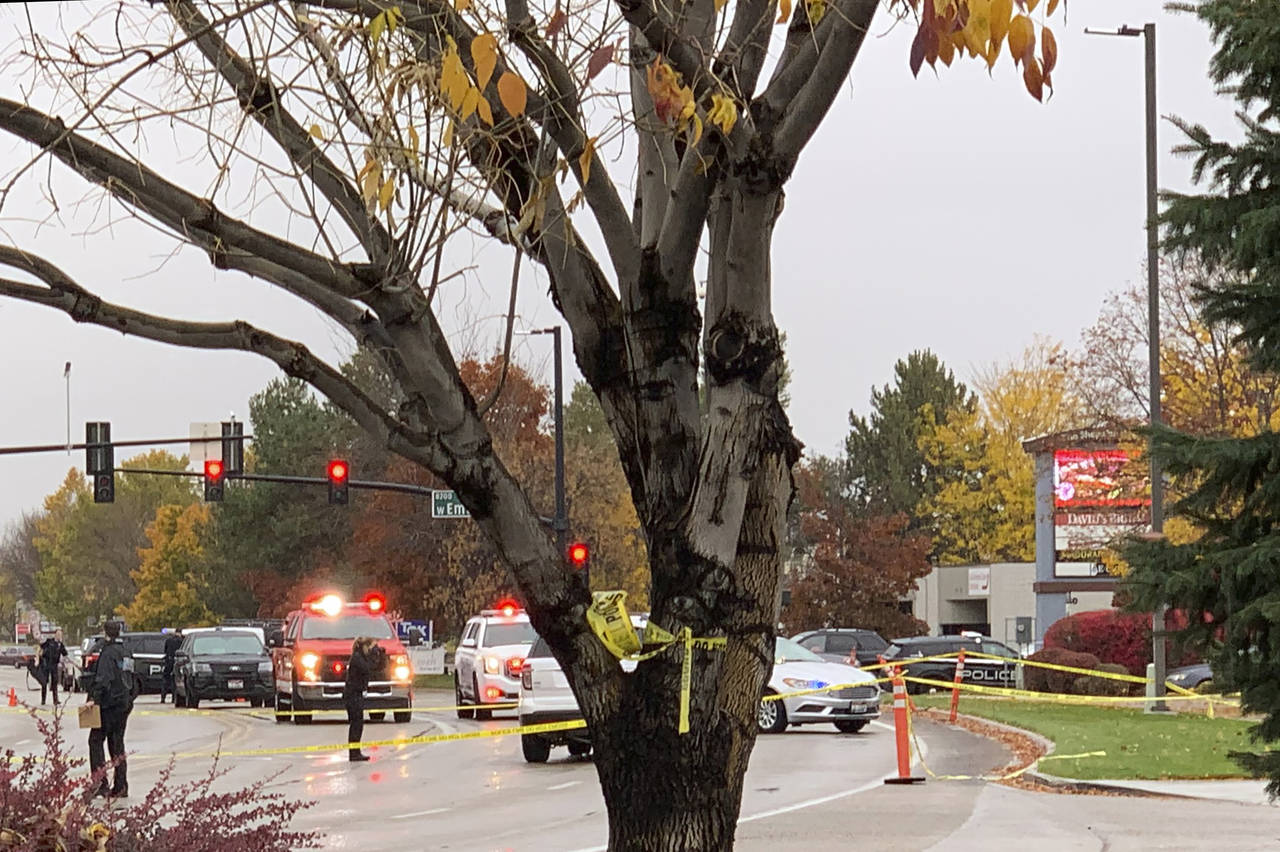 Police close off a street outside a shopping mall after a shooting in Boise, Idaho on Monday, Oct. ...
