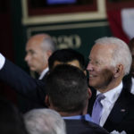 
              President Joe Biden takes a selfie as he greets people after speaking about his infrastructure plan and his domestic agenda during a visit to the Electric City Trolley Museum in Scranton, Pa., Wednesday, Oct. 20, 2021. (AP Photo/Susan Walsh)
            