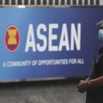 
              A security person stands outside the Association of Southeast Asian Nations (ASEAN) Secretariat in Jakarta, Indonesia, Monday, Oct. 25, 2021. Southeast Asian leaders are meeting this week for their annual summit where Myanmar's top general, whose forces seized power in February and shattered one of Asia's most phenomenal democratic transitions, has been shut out for refusing to take steps to end the deadly violence. (AP Photo/Achmad Ibrahim)
            